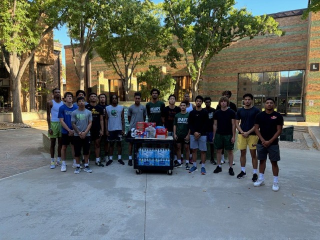 BEARS BASKETBALL donate to campus pantry